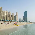 Walk To The Beach Or Enjoy The Amazing View From The Balcony